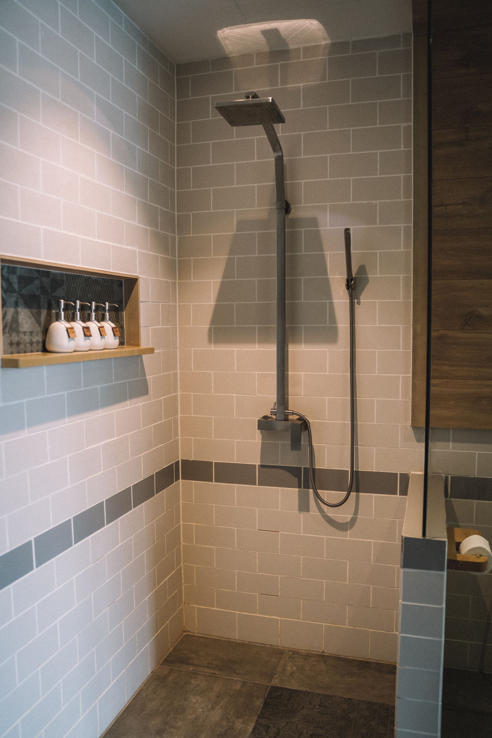 Contemporary bathroom with a glass shower and tiled surfaces